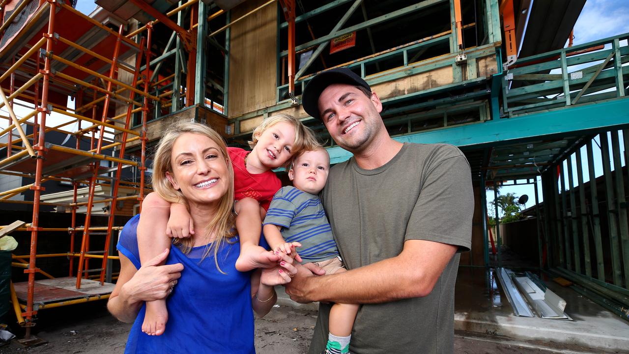 Liz Cantor with husband Ryan Lysaught and children Kit and Fin at their house build at Miami. Picture: Adam Head