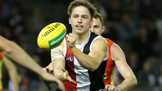 Jack Billings fires off a handball for St Kilda. Picture: George Salpigtidis