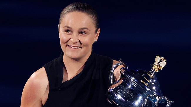 Ash Barty delivers the trophy on Saturday night. Picture: Mark Stewart