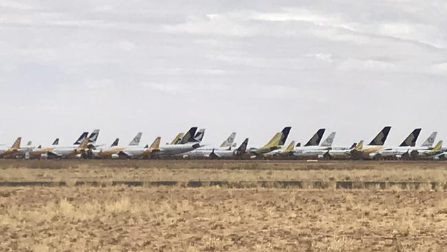 Unused planes have been parked at Alice Springs airport since the majority of international travel stopped. Picture: Brad Crouch