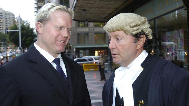 Barrister Peter Lavac (right) with bouncer Dirk Nierop outside Downing Court in Sydney. 