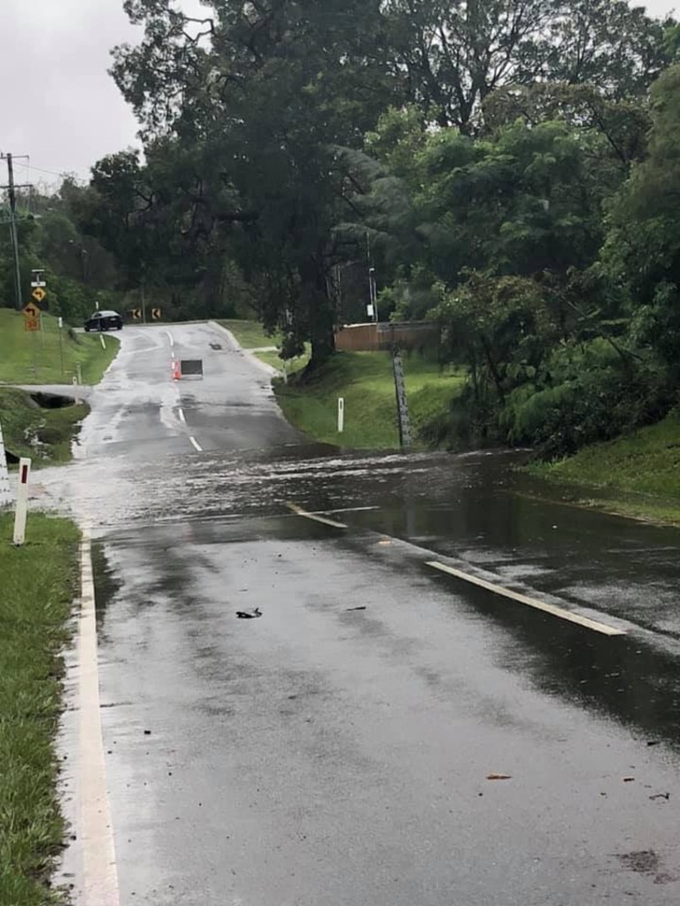 Grandview Rd at Pullenvale was cut by water. Picture: Cath Midson. Source: Facebook.