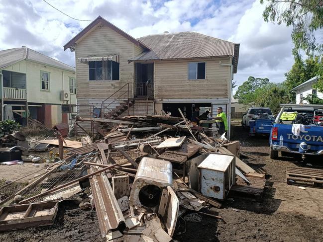 Just some of the rubbish outside Bill Walsh's Lismore home after flooding in February.