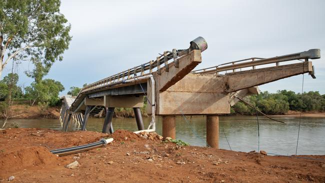 The damaged Great Northern Highway bridge over the Fitzroy River at Fitzroy Crossing, WA. Picture: Nathan Dyer