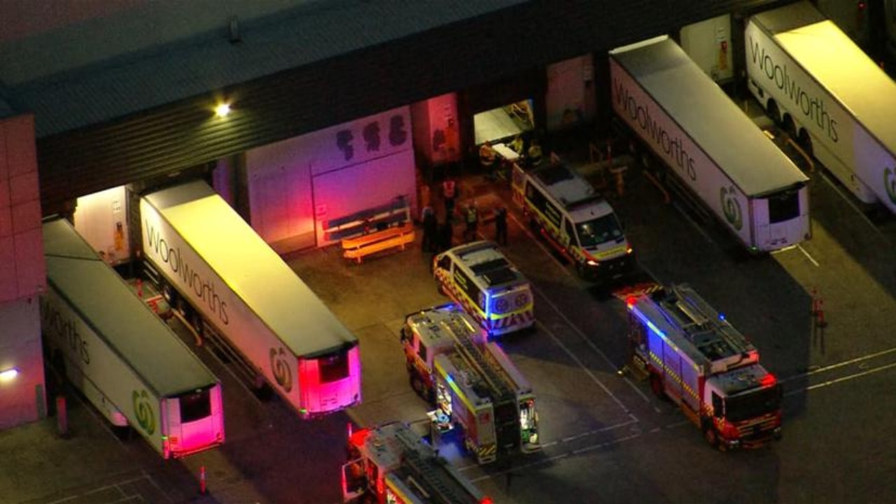 Paramedics rushed to the Woolworths Distribution Centre after the incident. Credit: 7NEWS