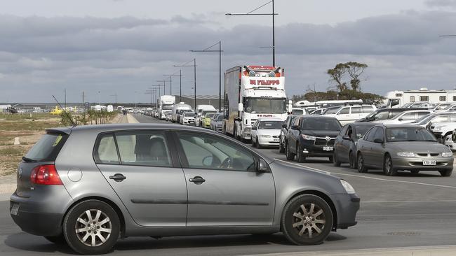 Cars already bumper to bumper at 2.30am on Sunday as racegoers leave The Bend Motorsport Park after the inaugural Supercars event at Tailem Bend. Picture: Sarah Reed