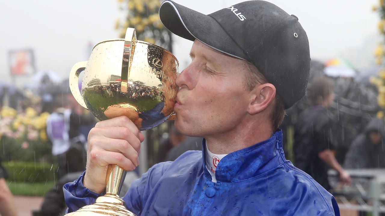 Kerrin McEvoy kisses the 2018 Melbourne Cup after winning with Cross Counter . Picture: Michael Klein