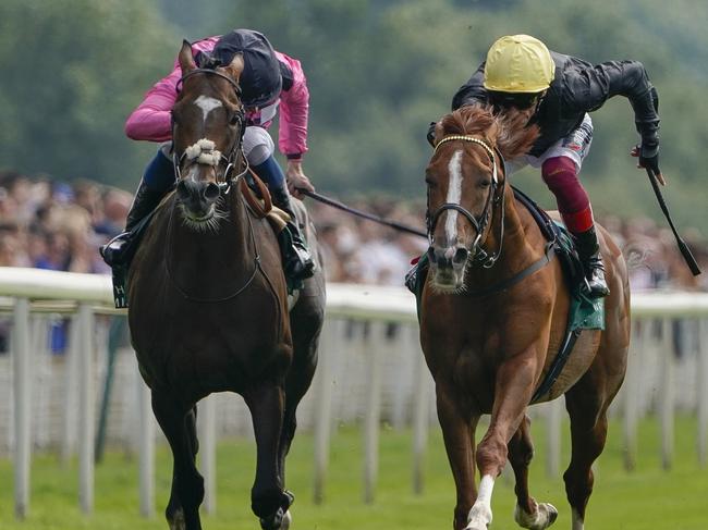 YORK, ENGLAND - AUGUST 20: Frankie Dettori riding Stradivarius (R) win The Weatherbys Hamilton Lonsdale Cup Stakes from William Buick and Spanish Mission (L) at York Racecourse on August 20, 2021 in York, England. (Photo by Alan Crowhurst/Getty Images)