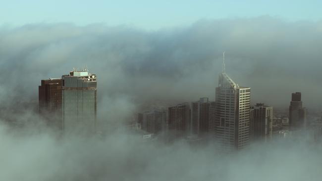 Only the tallest buildings are seen above the fog from the Eureka Skydeck. Picture: David Crosling