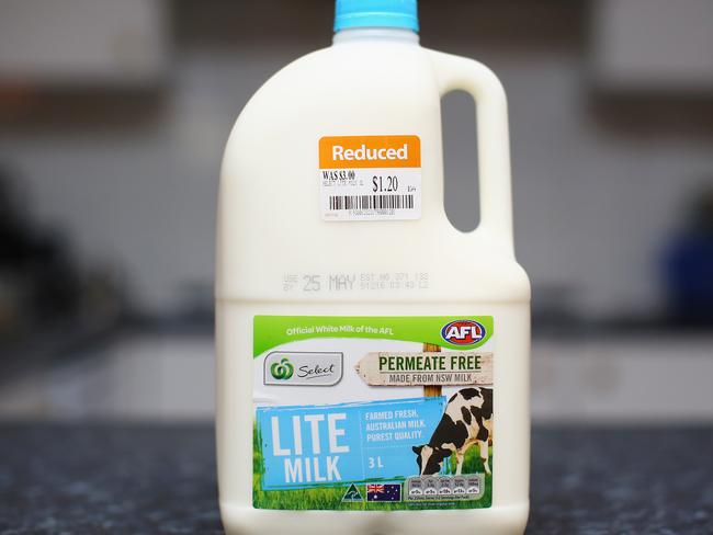 SYDNEY, AUSTRALIA - MAY 24: A three litre Woolworths Select branded milk bottle is pictured with a reduced price sticker on May 24, 2016 in Sydney, Australia. Australians are rallying around it's dairy farmers by opting to purchase branded milk rather than the cheaper store brands after the country's largest dairy company Murray Goulburn last month cut the price it pays suppliers by 15%. (Photo by Getty Images)