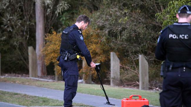 Police at the scene where a man was shot multiple times in Bellagio Crescent, Coomera. Picture: Richard Gosling