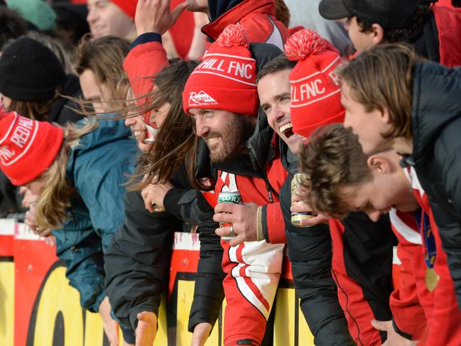 Red Hill supporters cheer on their side. Picture: Chris Eastman