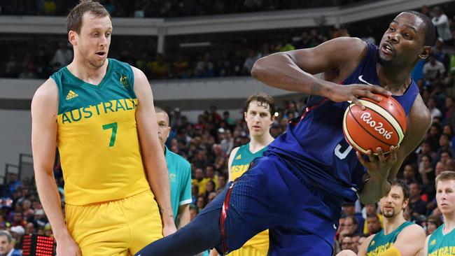 USA's guard Kevin Durant (R) vies with Australia's small forward Joe Ingles.