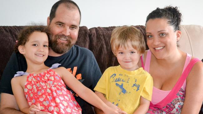 Damien Holt at home with wife Pamela and kids Levi and Gemma after a round of chemotherapy. Picture: File