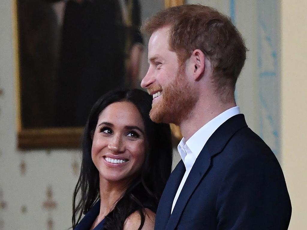 Britain's Prince Harry and Meghan, Duchess of Sussex attend a reception at Government House in Melbourne, Australia. Picture: AFP