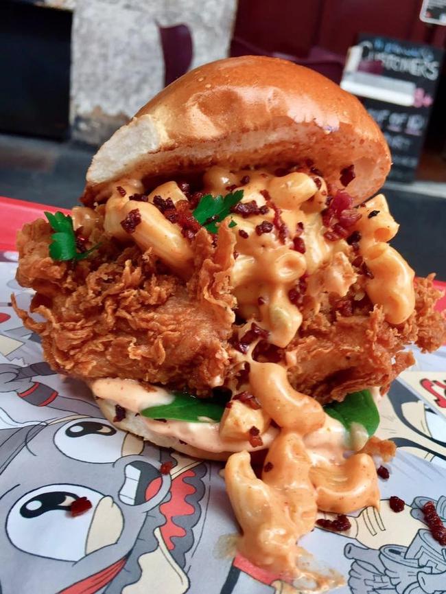 Ohhhh so cheesy. The Filthy Frank burger from Down N’ Out. Pic: Supplied