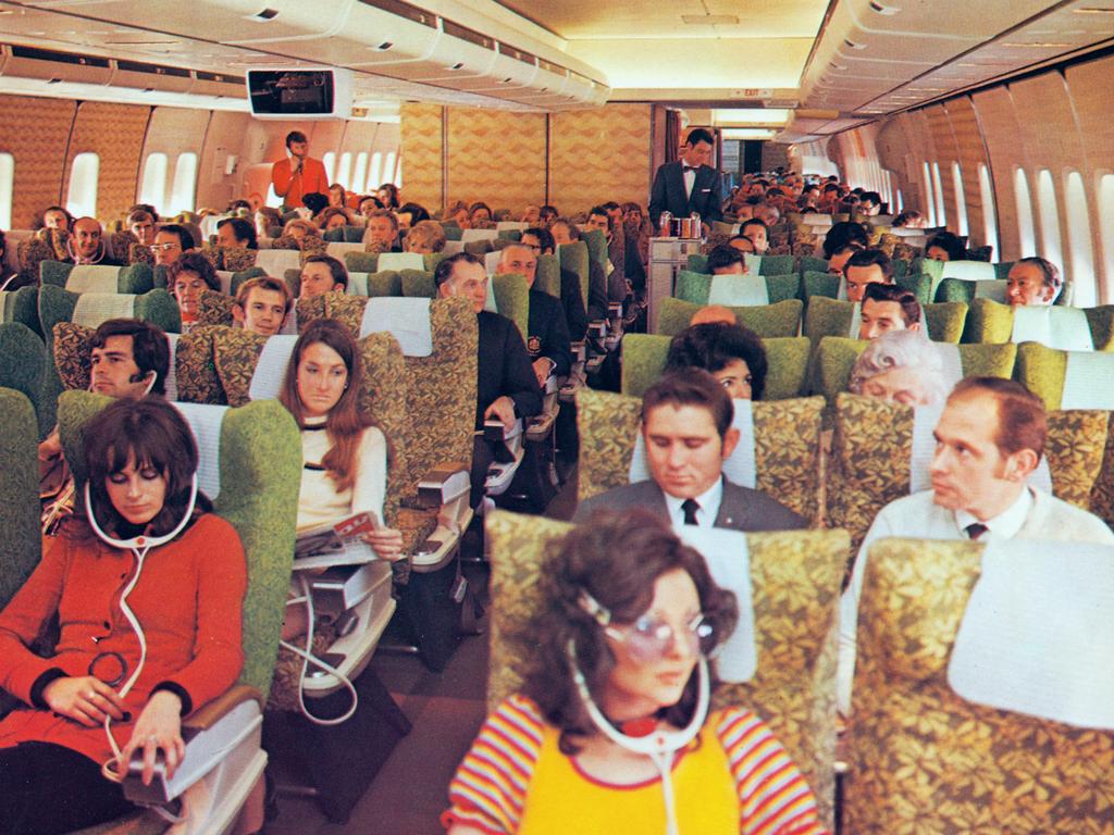 The vibrant 1970s Economy Class cabin of the first Qantas Boeing 747.