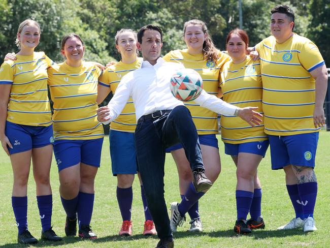 Leader of the Opposition David Crisafulli with the Division 5 Metro WomanÃs team during a visit to the Pine Rivers Football Club. Picture: Liam Kidston.