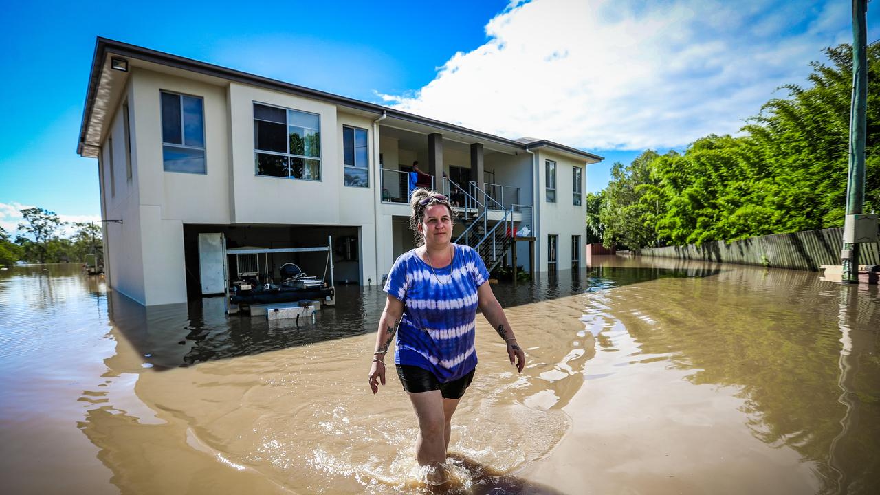 Mother-of-three Kylie Fulop outside her Beenleigh home in Omaru Street which was inundated by the Logan River. Picture: Nigel Hallett<b/>