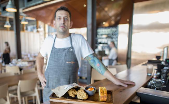 Brisbane Chef Damon Amos pictured with his dish KFD at his restaurant Detour. Picture: Jack Tran