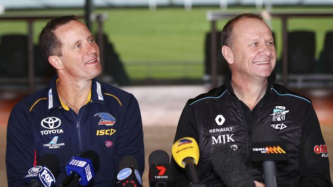 STAYING IN SA. Adelaide coach Don Pyke, left, and Port Adelaide coach Ken Hinkley can expect their AFL clubs to put forward new deals in the summer to keep them off the musical chair run started on Tuesday by the sacking of Gold Coast coach Rodney Eade. Picture: Sarah Reed.