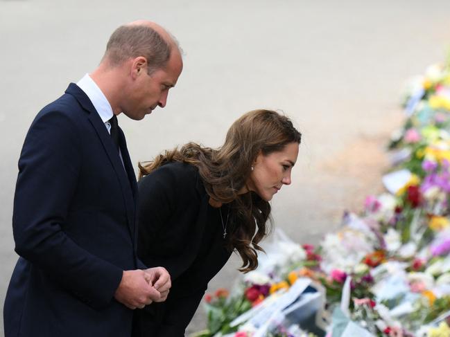 Prince William and Catherine, Princess of Wales view floral tributes outside Norwich Gate on the Sandringham Estate. Picture: AFP