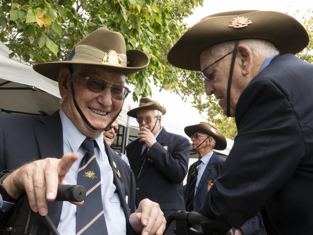 Serviceman catching up at the National Service 70th Anniversary memorial in East Creek Park. National servicemen, Ron Bryant (left) and Burt Hayter, from Brisbane.