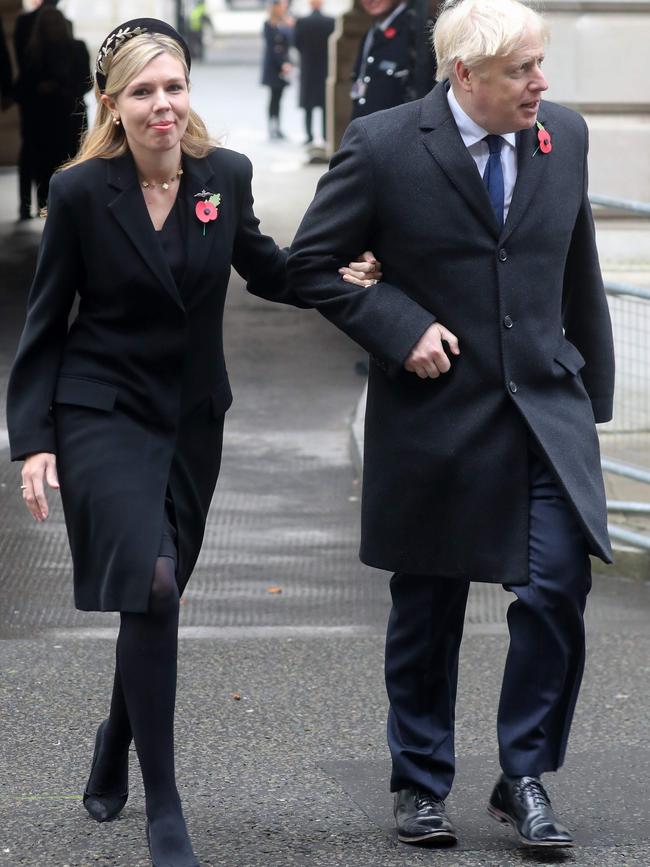 Carrie Symonds and Boris Johnson attend a Remembrance Sunday ceremony at the Cenotaph on Whitehall. Picture: AFP.