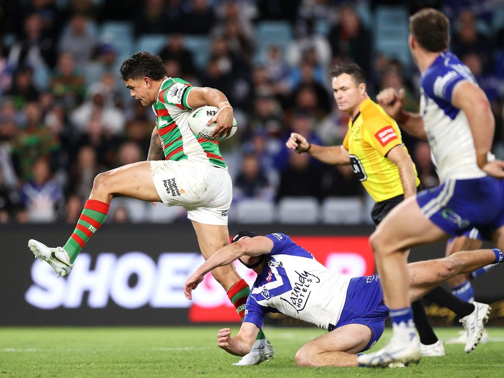 Latrell Mitchell bursts through Matt Burton’s attempted tackle in Round 18. Picture: Mark Kolbe/Getty Images