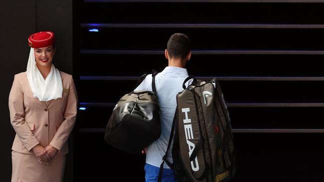 Novak Djokovic makes a very unfamiliar exit from Melbourne Park. Picture: Mark Stewart