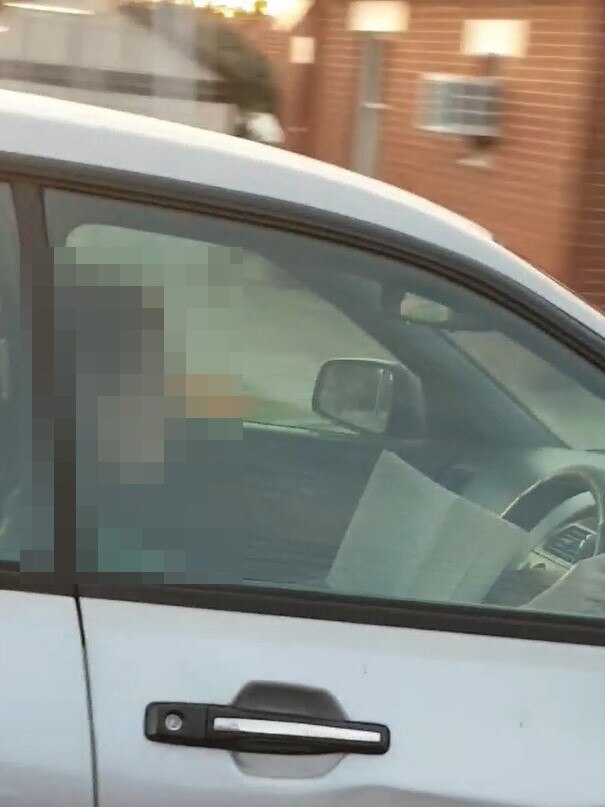 SA Police have fined a 25-year-old College Park woman for reading a book while driving along Lower North East Road, Campbelltown. Picture: SAPOL