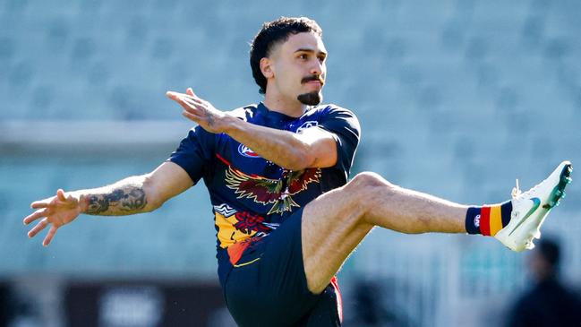 MELBOURNE, AUSTRALIA - MAY 18: Izak Rankine of the Crows warms up before the 2024 AFL Round 10 match between The Collingwood Magpies and Kuwarna (Adelaide Crows) at The Melbourne Cricket Ground on May 18, 2024 in Melbourne, Australia. (Photo by Dylan Burns/AFL Photos via Getty Images)