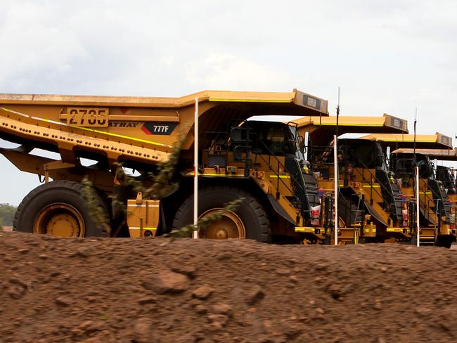 Giant trucks at the BHP Billiton/ GEMCO Groote Eylandt Manganese mine.