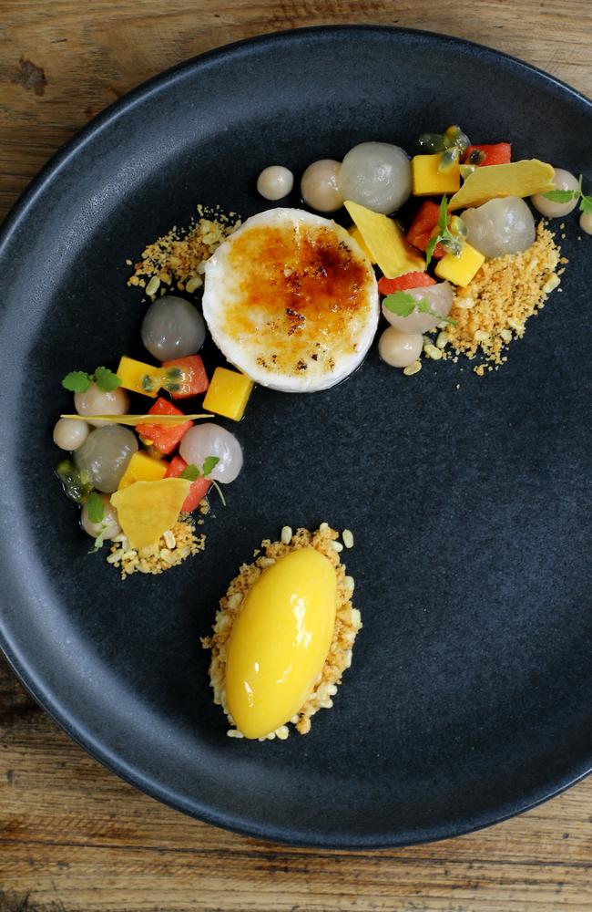 The sticky rice panna cotta ($18) had lovely bursts of tropical fruit, a mango sorbet and a coconut crunch. Picture AAP/David Clark