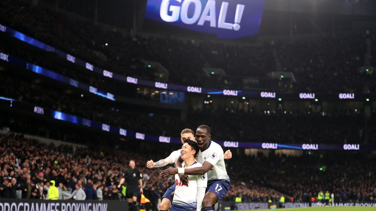 Spurs celebrated their new stadium with a 2-0 win over Crystal Palace.
