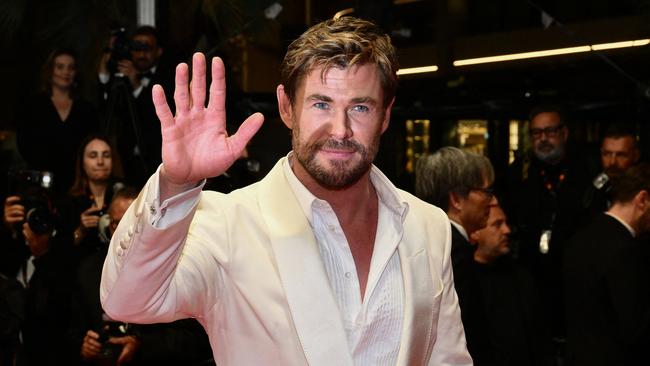 Australian actor Chris Hemsworth waves after the screening of the film "Furiosa. Picture: AFP