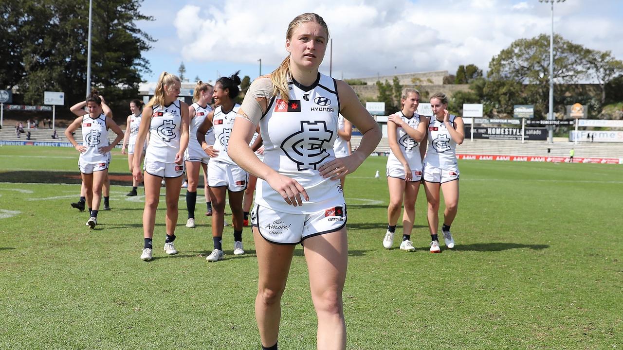 PERTH, AUSTRALIA - SEPTEMBER 17: The Blues leave the field after the teams draw during the 2022 S7 AFLW Round 04 match between the Fremantle Dockers and the Carlton Blues at Fremantle Oval on September 17, 2022 in Perth, Australia. (Photo by Will Russell/AFL Photos via Getty Images)