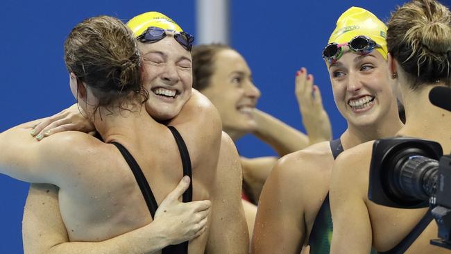 Australia's Emma McKeon, Brittany Elmslie, Bronte Campbell and Cate Campbell celebrate.