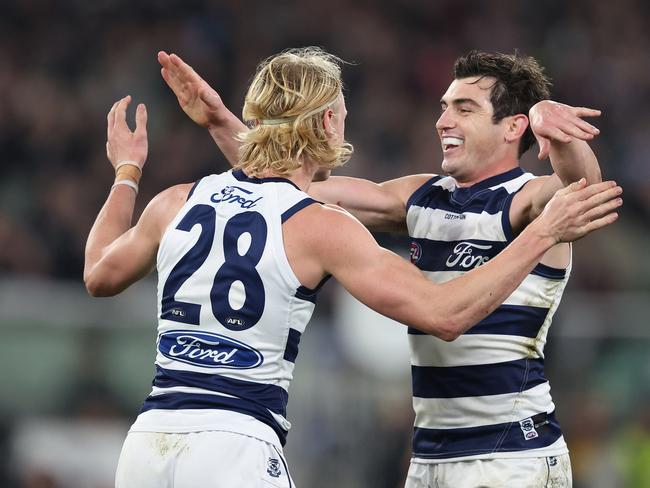 Ollie Dempsey and Shaun Mannagh enjoy a Cats goal. Picture: Robert Cianflone/Getty Images