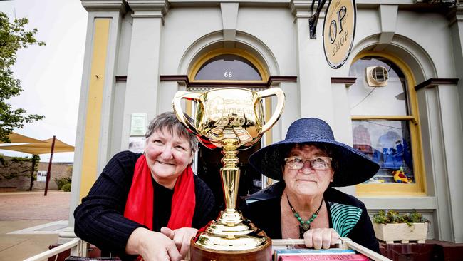 Sally Rowe and Ann French with last year’s Lexus Melbourne Cup at the Donald Op Shop. Picture: Nicole Cleary