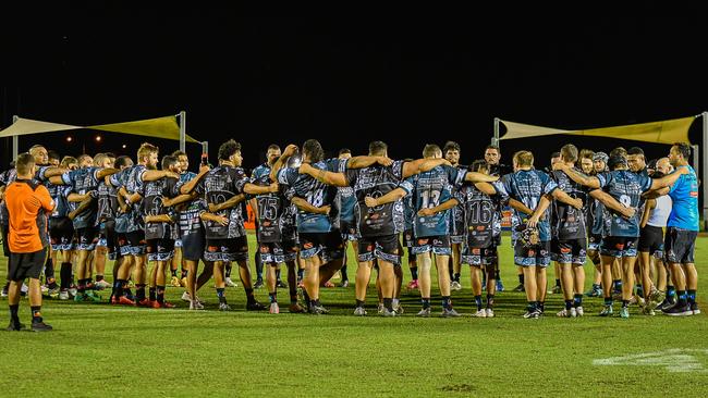 The Territory All Stars and Indigenous All Stars men come together after their match in the 2023 Deadly Cup Carnival. Picture: Pema Tamang Pakhrin