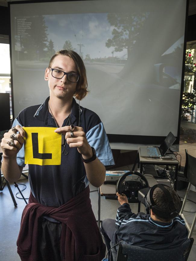 Clifford Park Special School students Seth Jennings (left) and Harley Deller use a learn to drive virtual reality hub, donated by the Endeavour Foundation, aimed at getting as many students as possible on the path to independence. Picture: Kevin Farmer