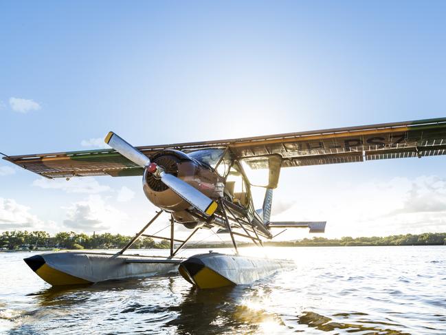 WHAT A VIEW: The Paradise Seaplane in action over Pumicestone Passage.