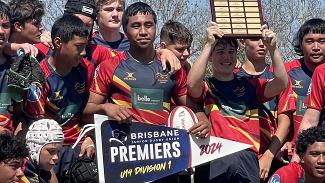 Elijah Nosa and his Riverside teammates celebrating a grand final win last weekend at Easts.