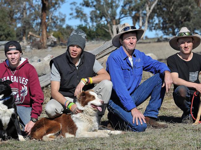 Backtrack founder Bernie Shakeshaft (blue) with three of the boys he has mentored – Brett Orcher, Zac Craig and Brendon Lowe. Picture: Paul Mathews