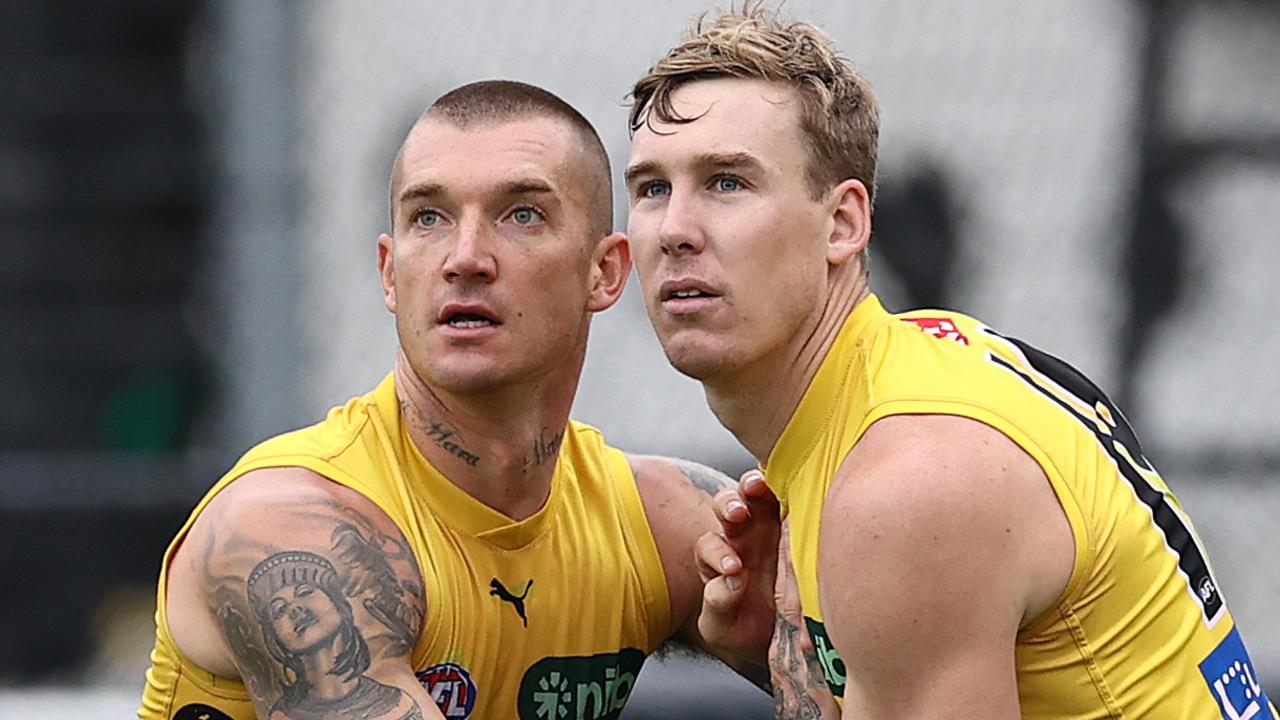 Tom Lynch battles Dustin Martin at Richmond training. Picture: Michael Klein