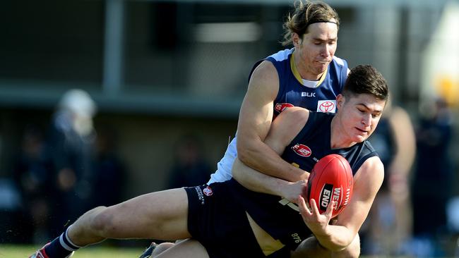 Pfeiffer lays a tackle for Adelaide’s SANFL side. Picture: Mark Brake