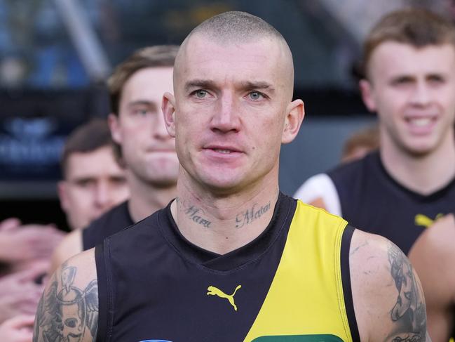 MELBOURNE, AUSTRALIA - JUNE 30: Dustin Martin of the Tigers runs out with the team during the round 16 AFL match between Richmond Tigers and Carlton Blues at Melbourne Cricket Ground, on June 30, 2024, in Melbourne, Australia. (Photo by Daniel Pockett/Getty Images)