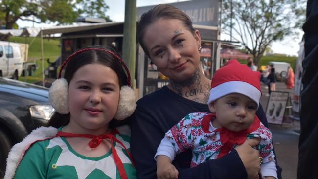 Tenelle, Tamryn and Oakland Gibson at Christmas in the Park 2022.