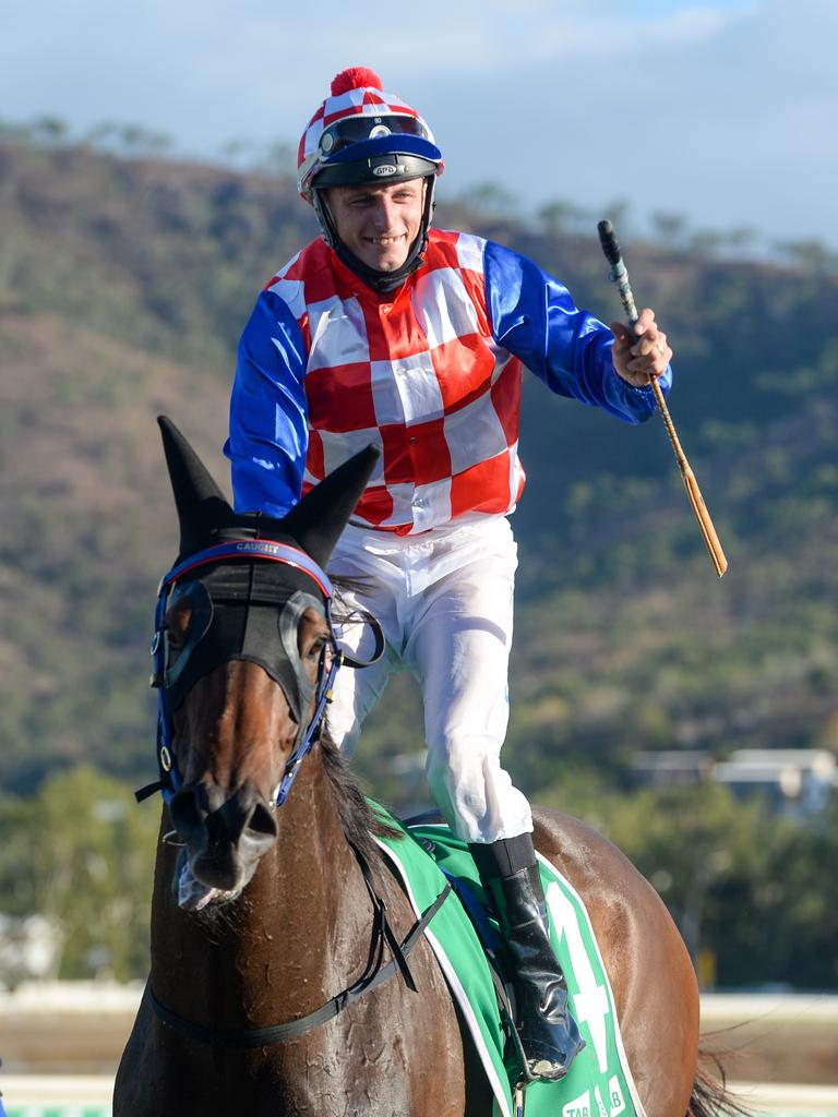 Jockey Scott Sheargold on TAB Townsville Cup winner Fortification salutes the Cluden Park crowd. Picture: Scott Radford-Chisholm